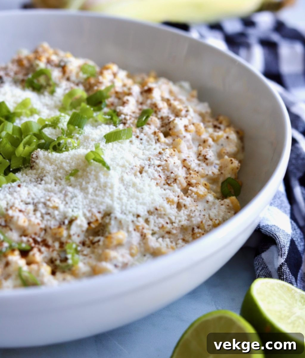 CBCF3522-25FC-4830-9144-19F3A10CFC2F Creamy Mexican Street Corn Dip with tortilla chips.