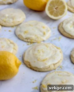 Sunshine Lemon Delights by Kate 4 Lemon cookie dough portioned and rolled into smooth balls, ready for baking on a parchment-lined tray.