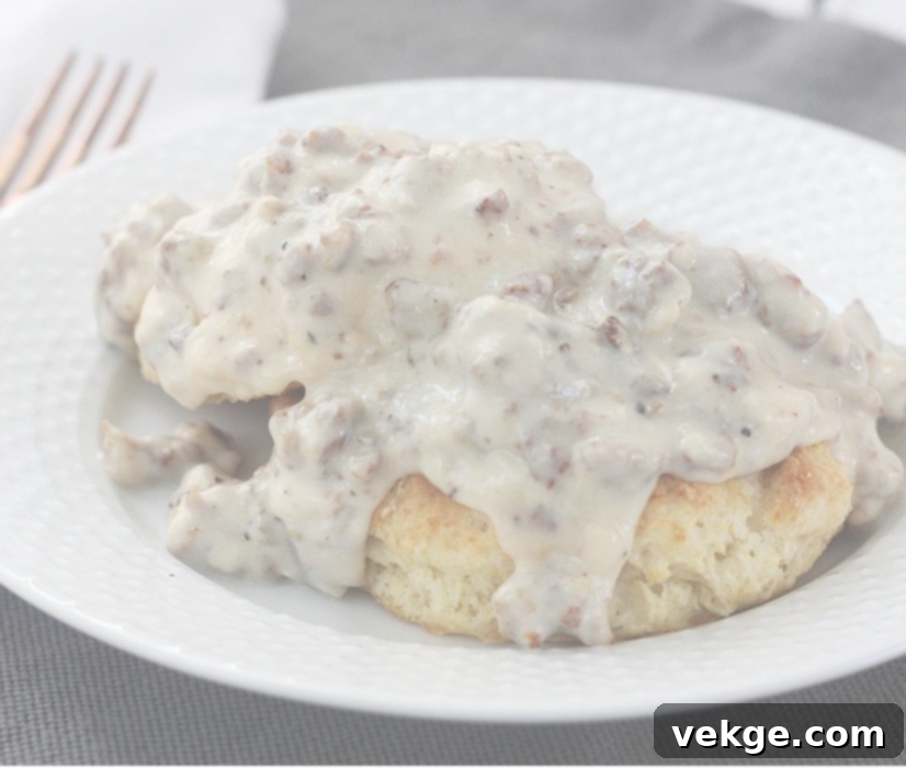 Mind-Blowing Sausage Gravy 5 A skillet filled with rich, creamy sausage gravy, ready to be served over hot biscuits.