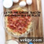Hearty Bacon and Swiss Quiche 4 Layers of grated Swiss cheese, sautéed onion, and crumbled bacon arranged in a pie dish.