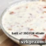 Hearty Bacon and Swiss Quiche 7 The crustless quiche baking in the oven, achieving a beautiful golden-brown color.