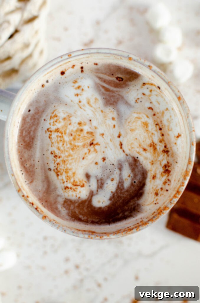A final shot of a perfectly crafted mug of homemade hot chocolate, inviting a warm sip.