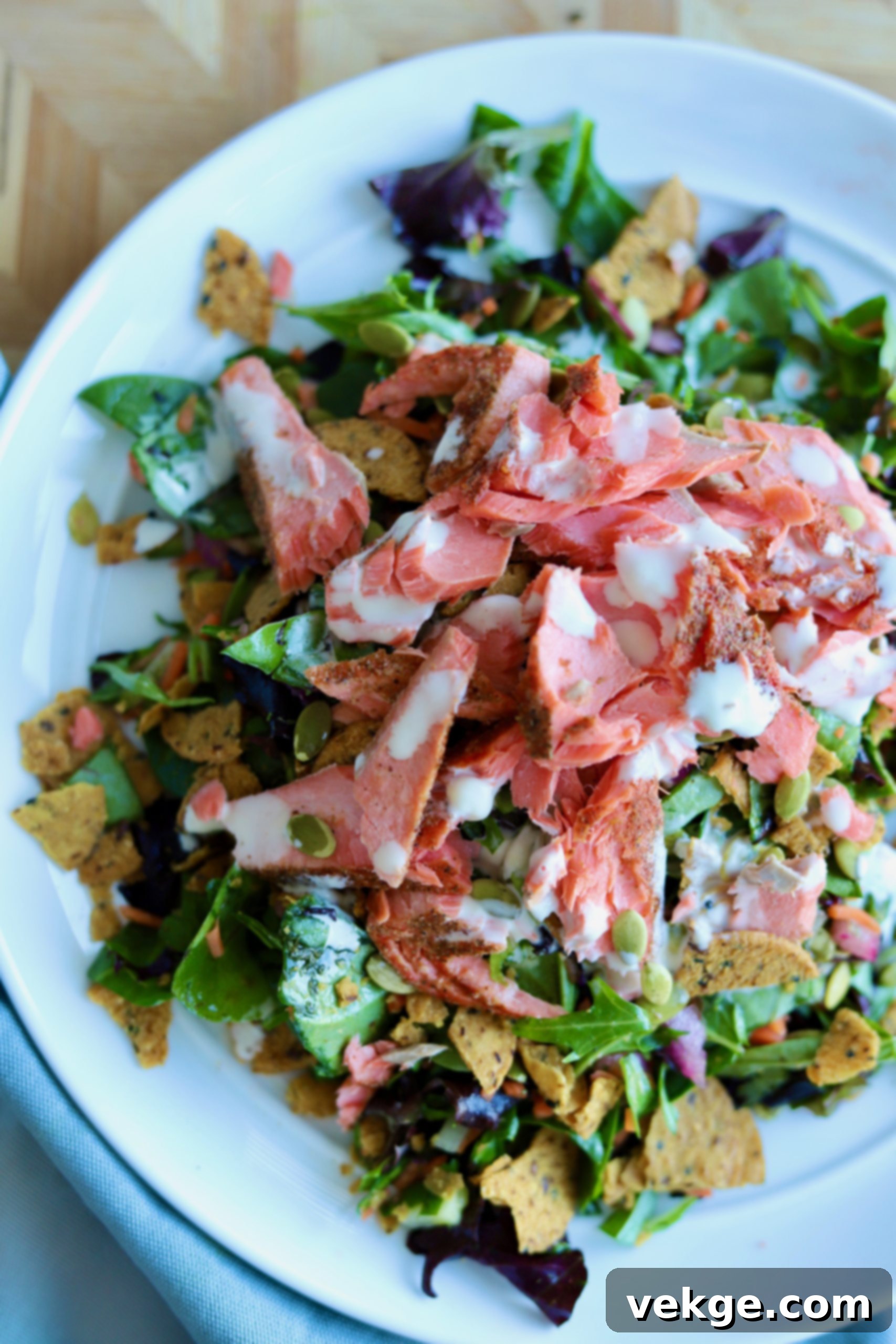 Vibrant Salmon Medley 2 A vibrant, finely chopped salmon salad in a bowl.