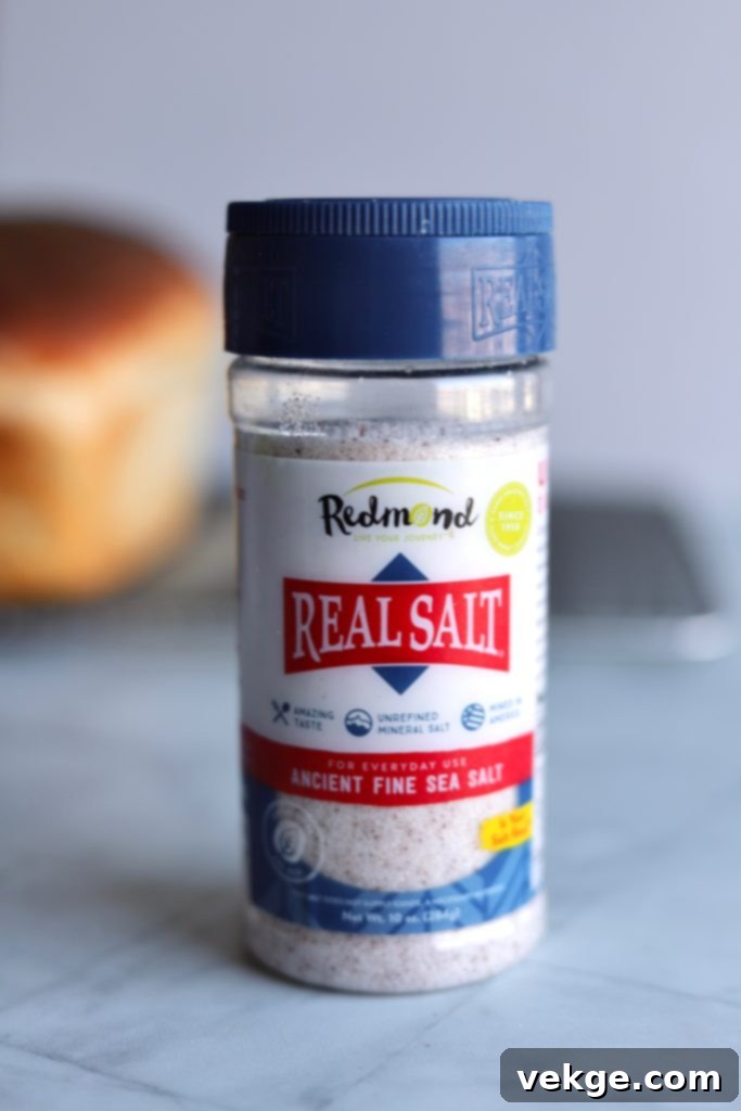 Perfectly Moist Chocolate Banana Muffins 3 A selection of baking ingredients, including a bowl of cocoa powder, salt, and chocolate chips, ready for mixing into the muffin batter.