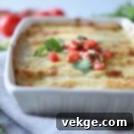 Ultimate Chicken Enchiladas 3 Shredded chicken seasoned with spices and lime for enchilada filling