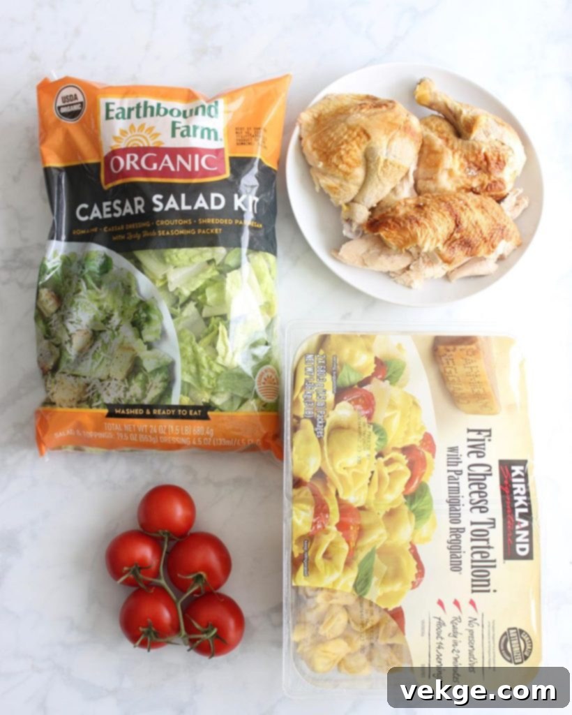 Ultimate Chicken Tortellini Caesar 3 Close-up of the cooked cheese tortellini and chopped rotisserie chicken, ready for salad assembly.
