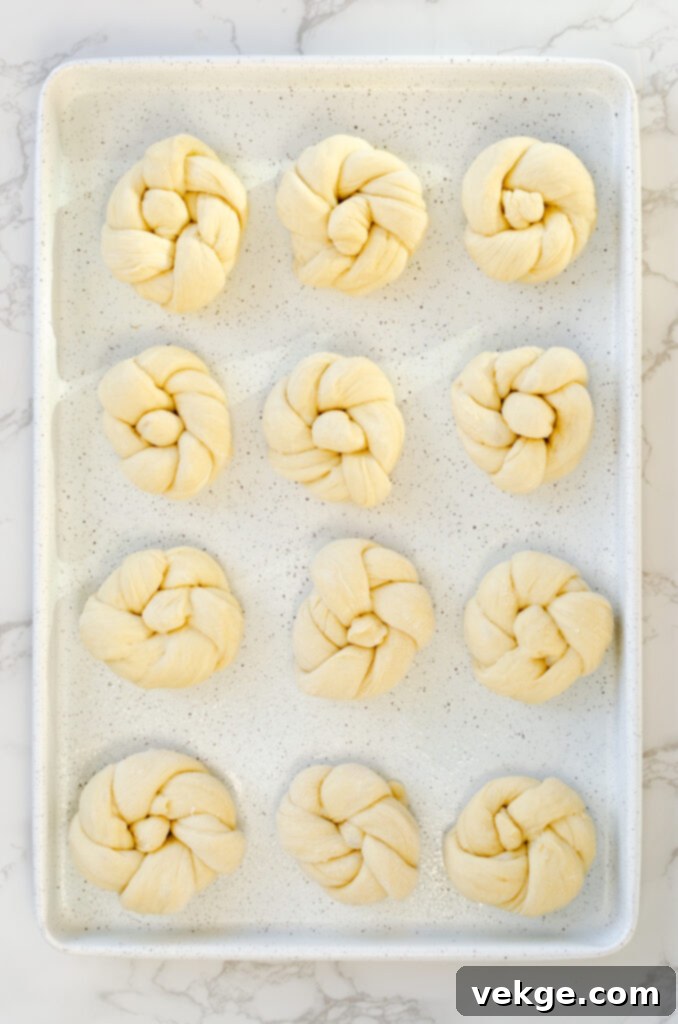 Irresistible Garlic Parmesan Knots 7 Garlic Parmesan Knots with butter topping