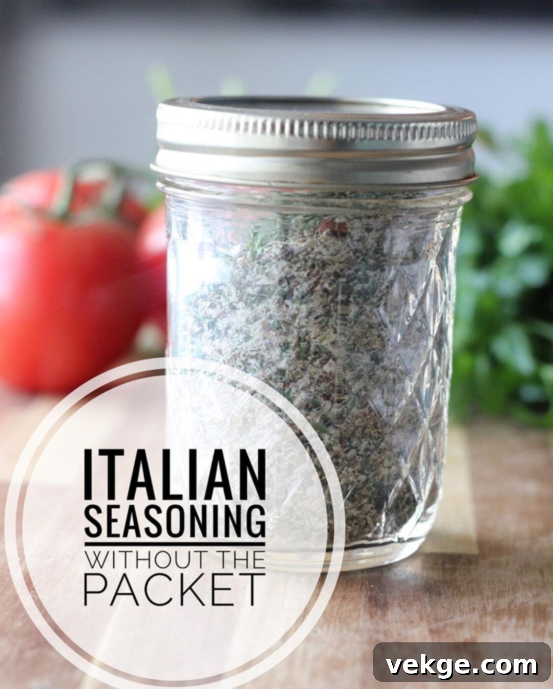 Homemade Italian Seasoning Mix 3 A close-up of a jar of homemade Italian seasoning, with scattered dried herbs around it.