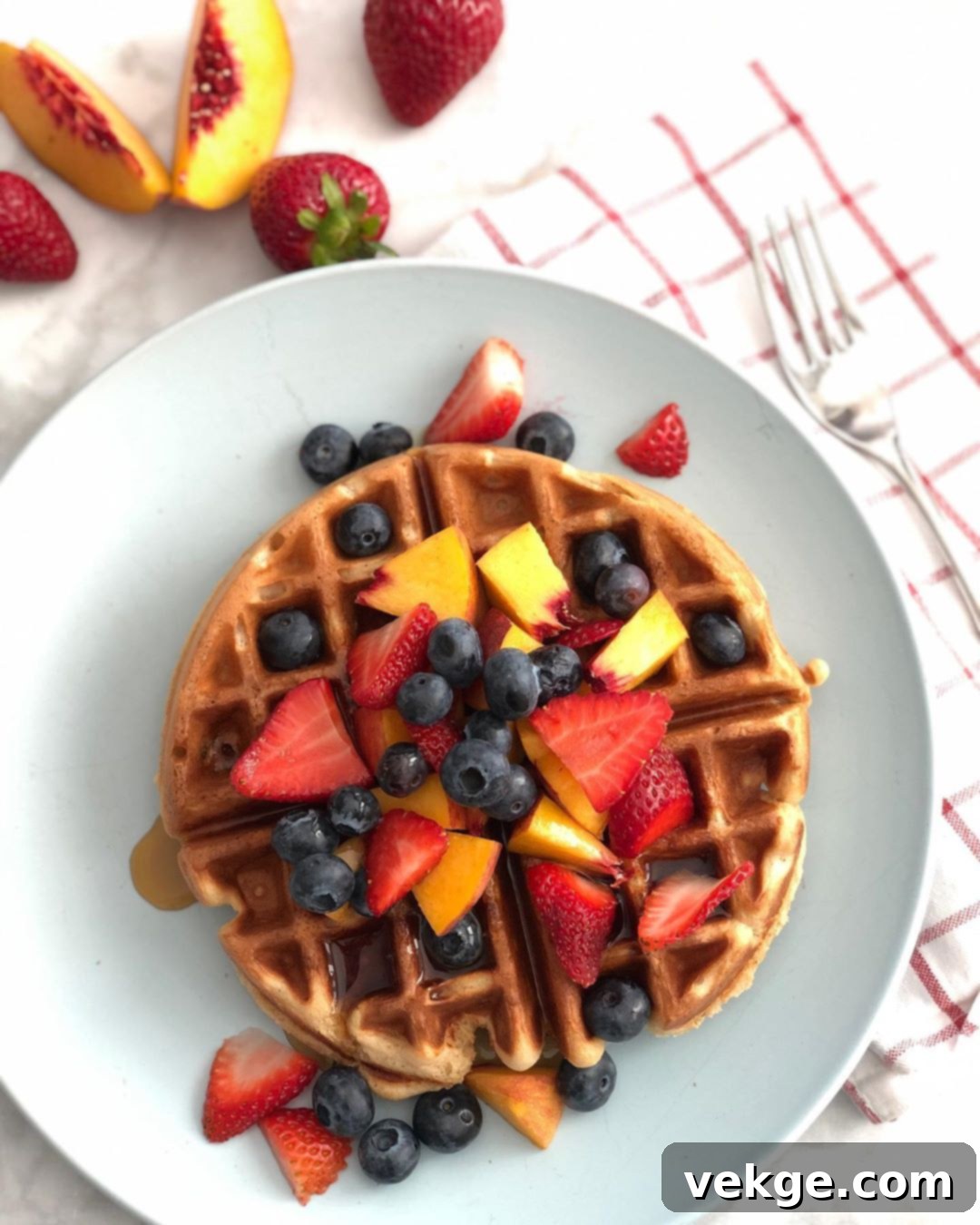 Artisan Sourdough Waffles 4 Close-up of a single sourdough waffle, showing its inviting texture and golden crispness