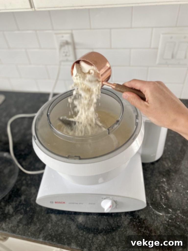 Various types of flour in bowls, showcasing options for sourdough baking.