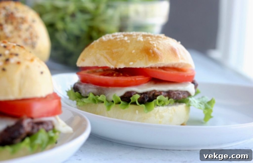 Artisan Sourdough Burger Buns 3 Close-up of the soft, inviting crumb of a homemade sourdough hamburger bun, indicating its superior texture.