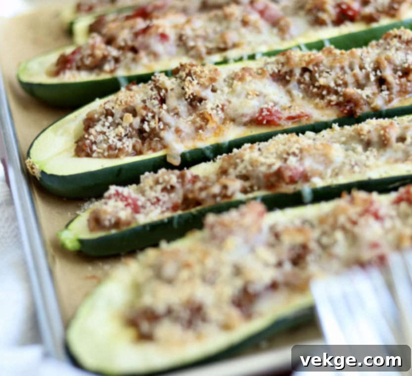 Loaded Zucchini Boats 4 Stuffed Zucchini Boats recipe image with a crispy topping