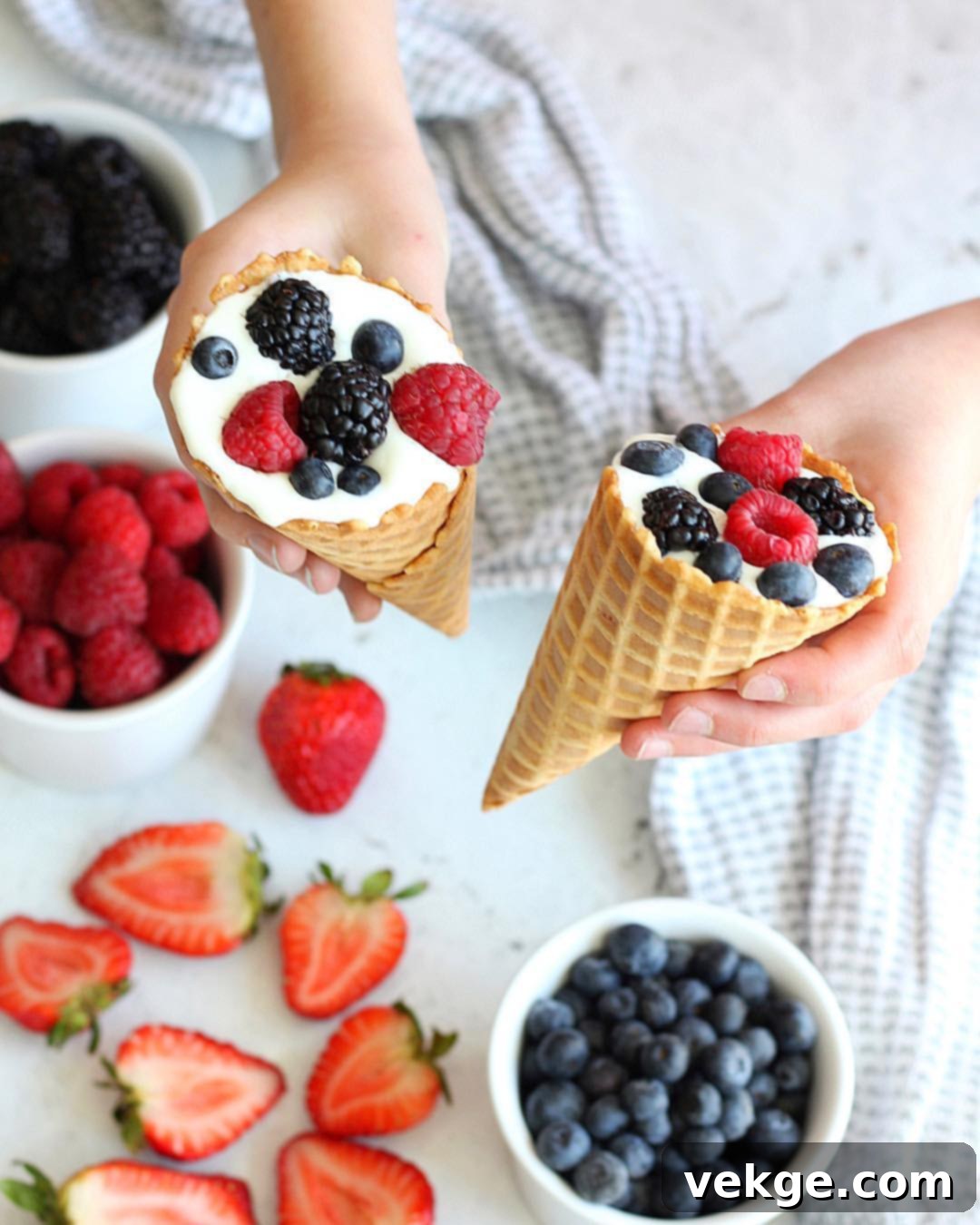 Grecian Cream Cone 2 A refreshing Greek yogurt cone with fresh berries, captured beautifully.