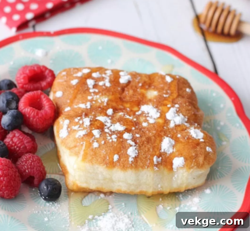 Delicious Homemade Scones 4 A stack of golden-brown scones, freshly baked and ready to eat.