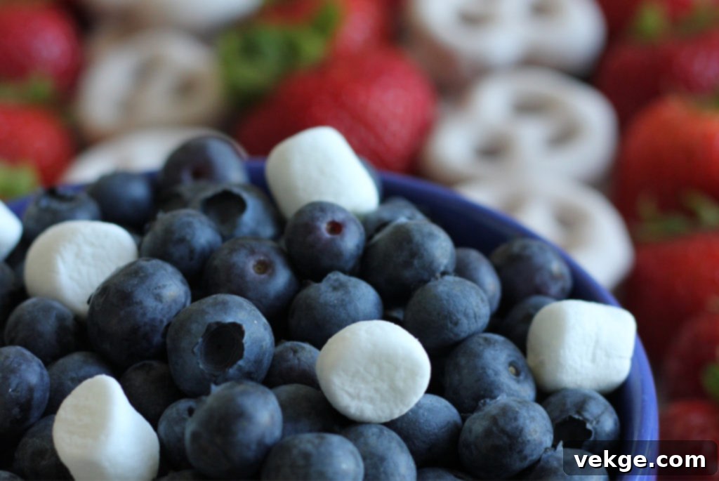 Patriotic Party Bites 3 An inviting platter filled with colorful Patriotic Fruit Skewers, beautifully presented for a festive 4th of July party.