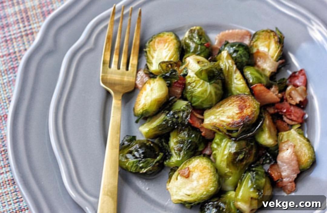 Perfectly roasted maple bacon Brussels sprouts, golden and crispy, ready to be served.