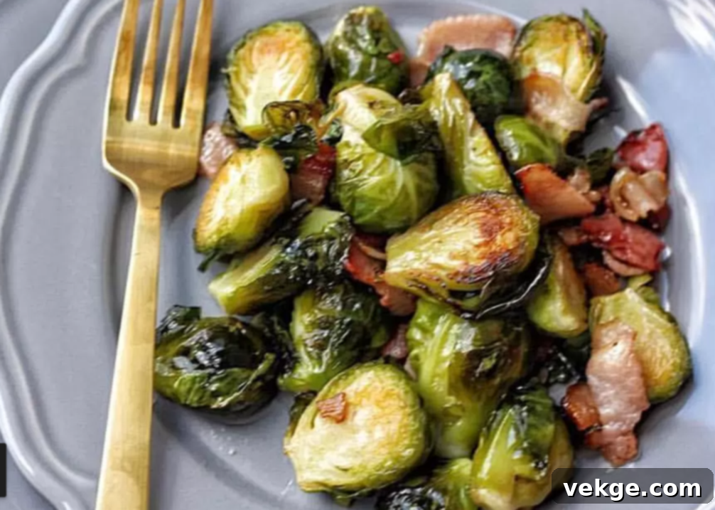 A delicious bowl of roasted brussel sprouts with bacon and maple syrup