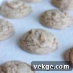 Golden Harvest Cookie Delights 5 Close-up of soft, perfectly baked spice cake mix cookies with a hint of cinnamon sugar, ready for frosting.