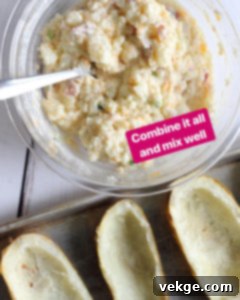 Double-Baked Delight 9 All ingredients for the potato filling, including mashed potato, cheese, bacon, milk, butter, and green onions, combined in a bowl.