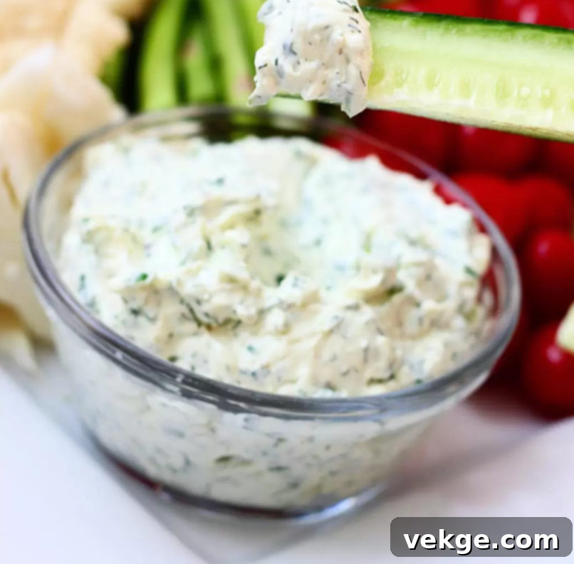 Vibrant Veggie Dip 4 The finished creamy veggie dip, garnished with fresh herbs, ready to be served.