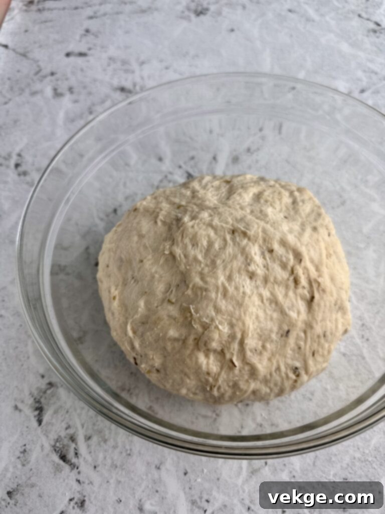 Artisan Rosemary Sourdough French Bread 12 Dough resting in a bowl for bulk fermentation