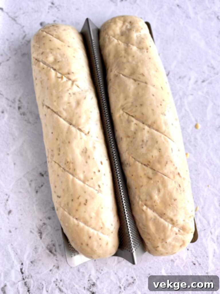 Artisan Rosemary Sourdough French Bread 15 Close-up of dough being scored before baking