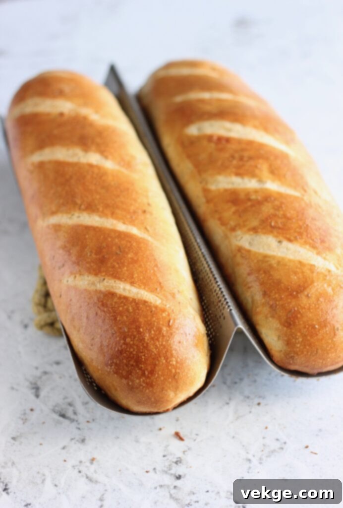 Artisan Rosemary Sourdough French Bread 3 Close-up of dough rising in a bowl