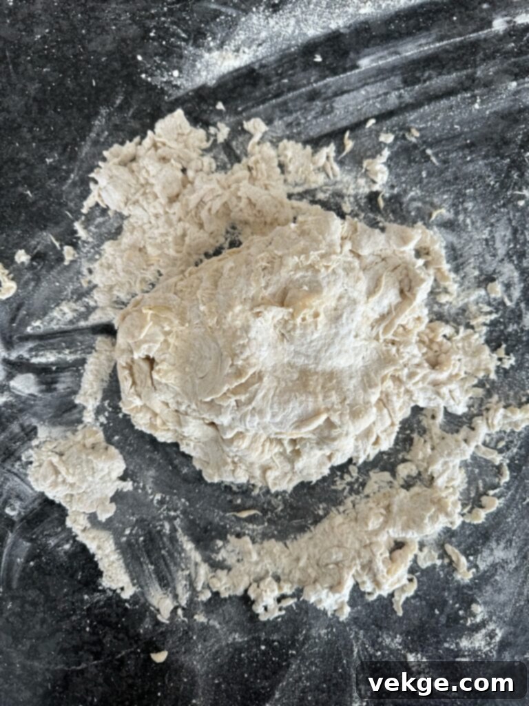 Artisan Rosemary Sourdough French Bread 10 Dough forming in a mixer