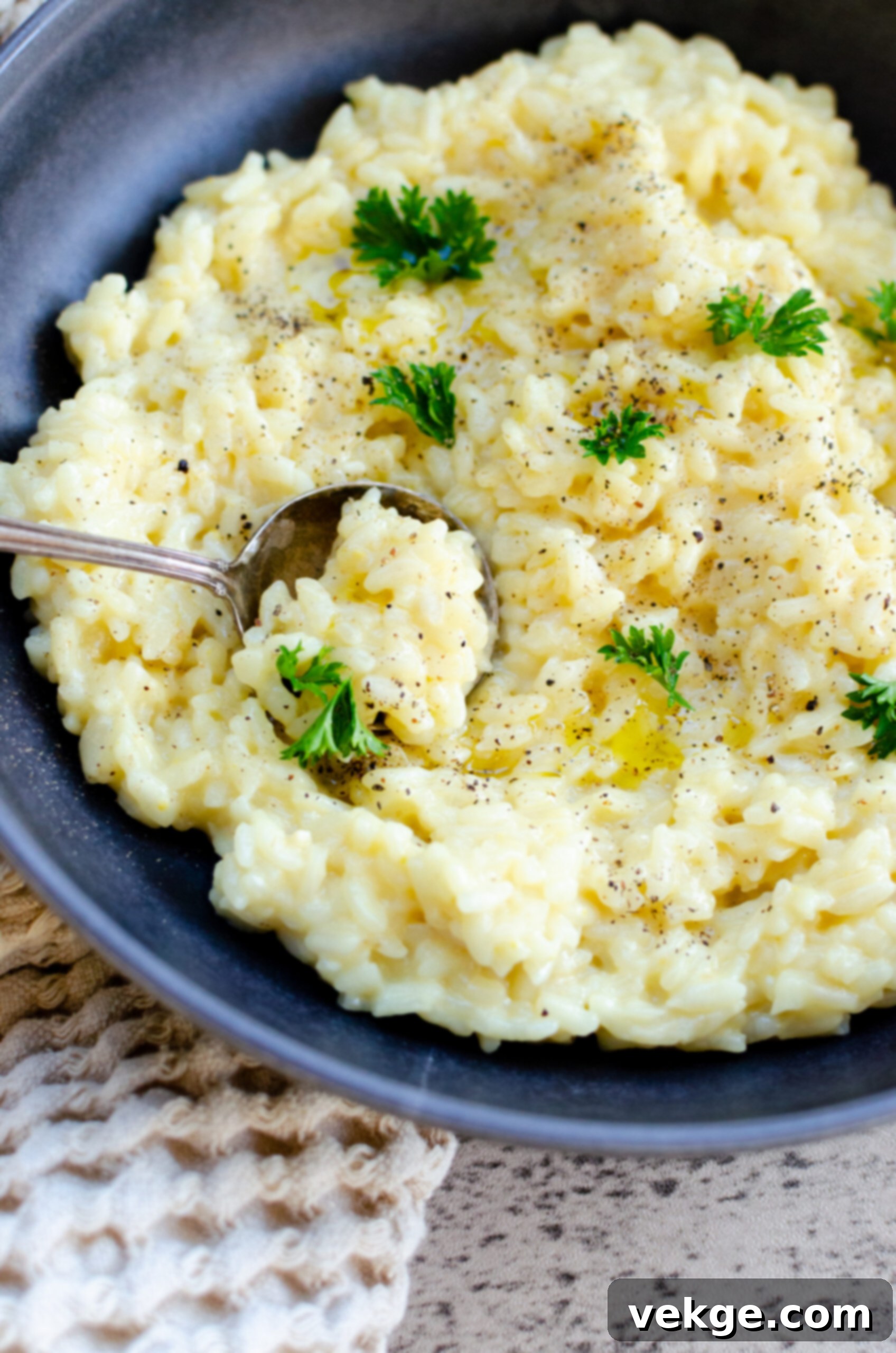Effortless Instant Pot Risotto 8 A bowl of freshly prepared Instant Pot Risotto, close-up to show the creamy texture.
