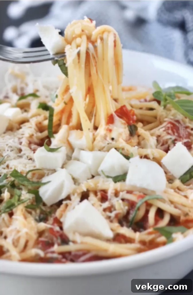 Vibrant Margarita Cake 2 Close-up of fresh Margarita Pasta with cherry tomatoes, basil, and mozzarella