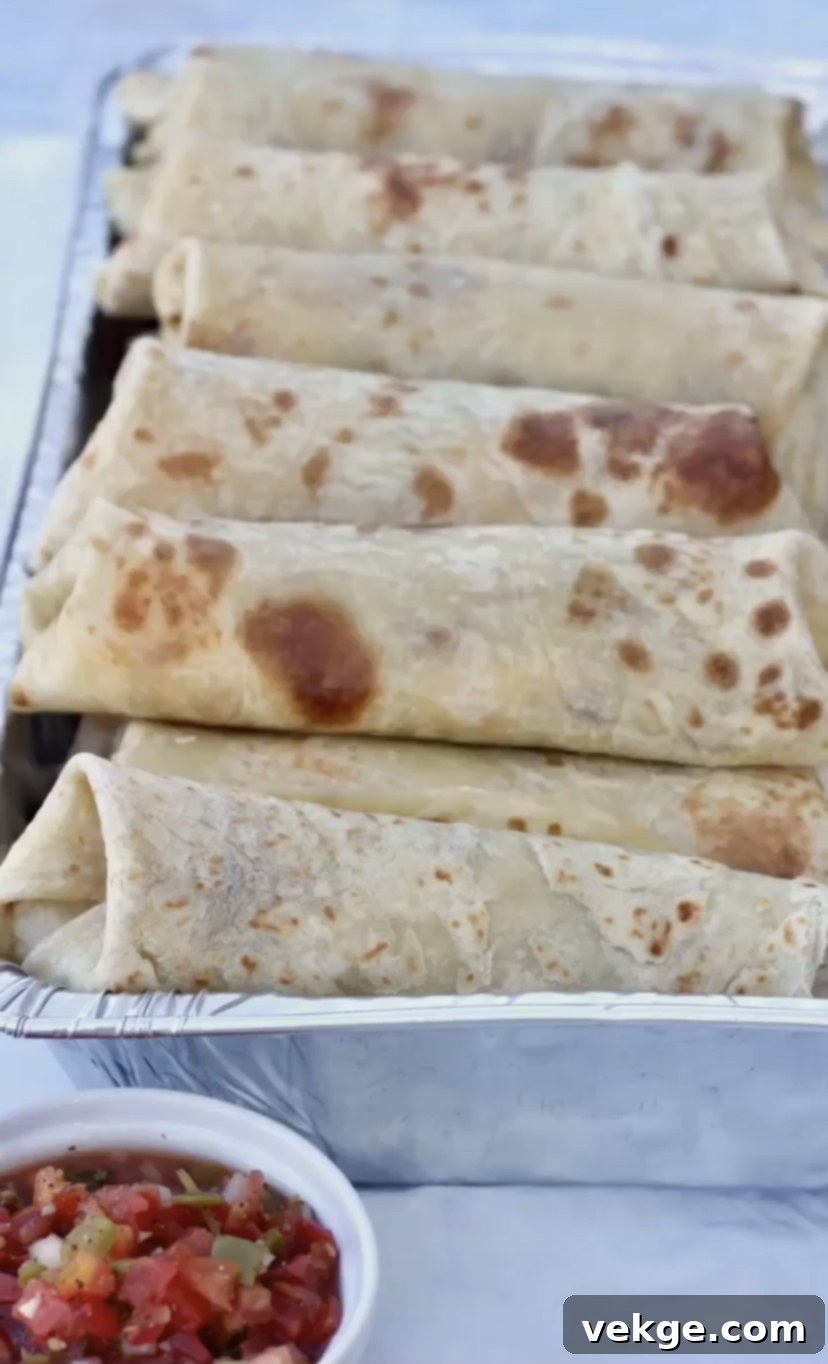 Adventure-Ready Breakfast Burritos 3 Freshly prepared breakfast burritos, showcasing the delicious fillings.