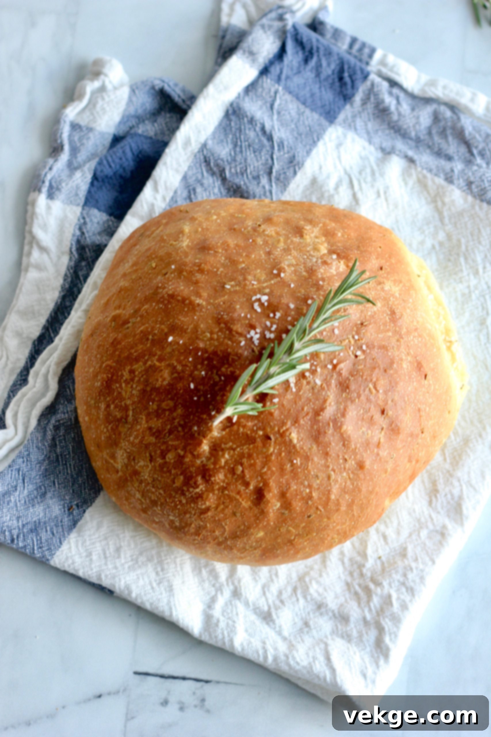 Fragrant Rosemary Bread 2 Freshly baked Rosemary Bread loaf with a golden, olive oil crust