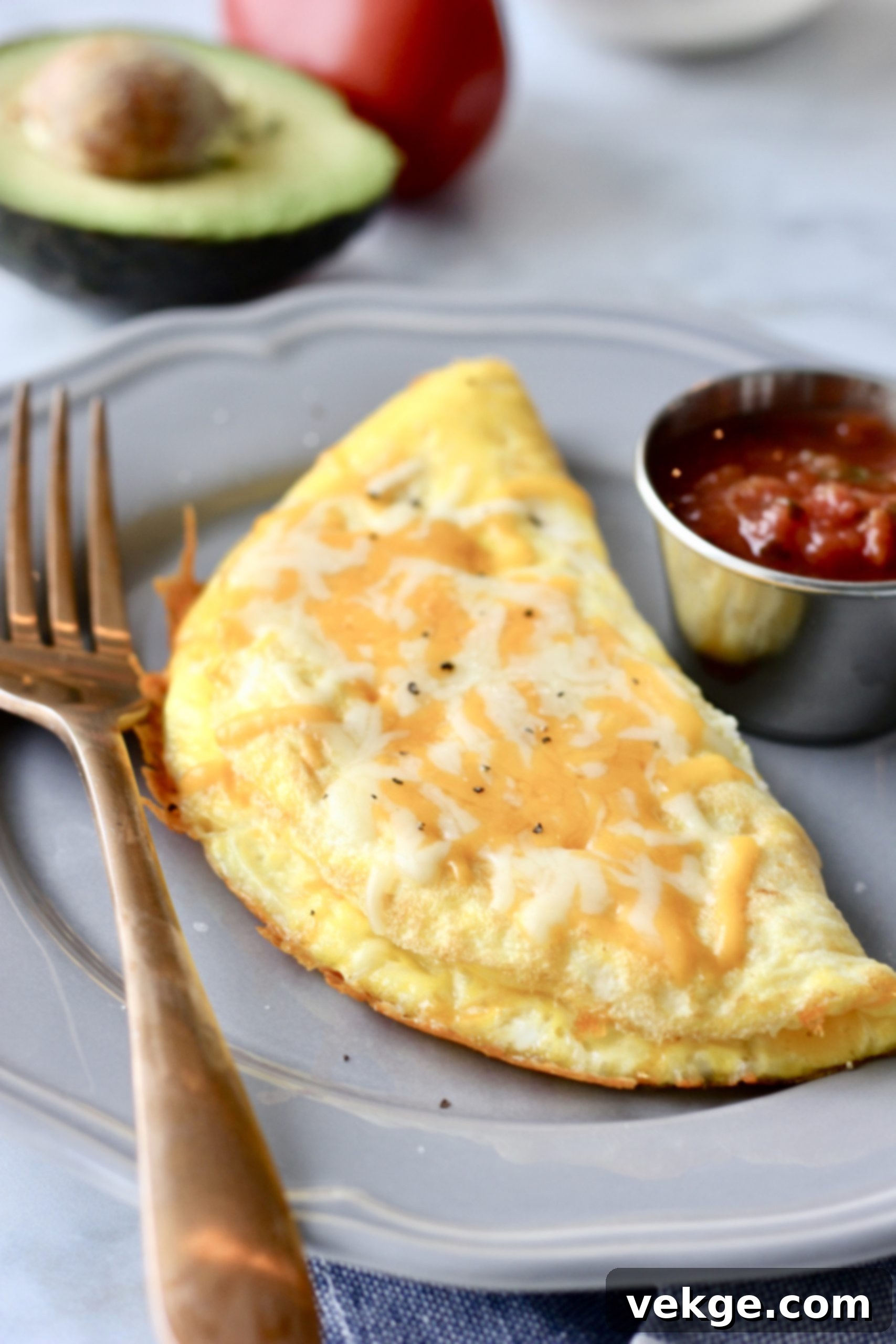 Omelette in 4 Minutes 2 Perfectly cooked omelette with fresh herbs and cheese, ready for breakfast