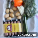 Sheet Pan Sausage and Veggies 3 Sliced pineapple chicken sausage, a key ingredient for unique flavor.