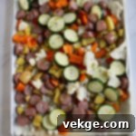 Sheet Pan Sausage and Veggies 6 Chopped bell peppers add sweetness and vibrant color to the dish.