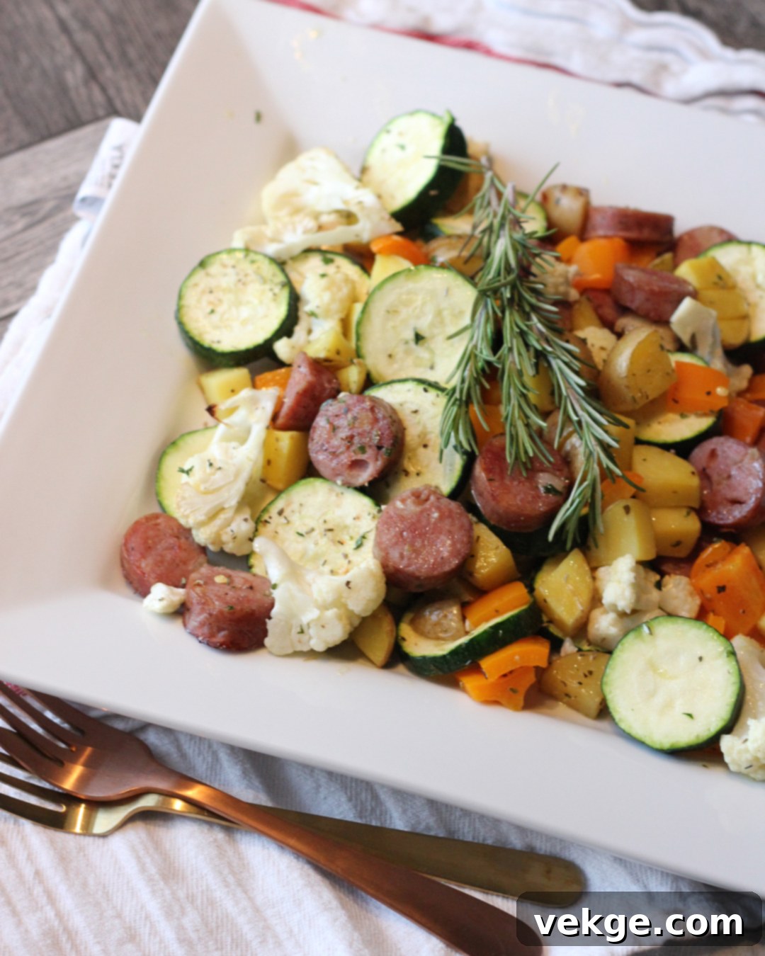 Sheet Pan Sausage and Veggies 10 A perfectly cooked sheet pan dinner of roasted vegetables and sausage.
