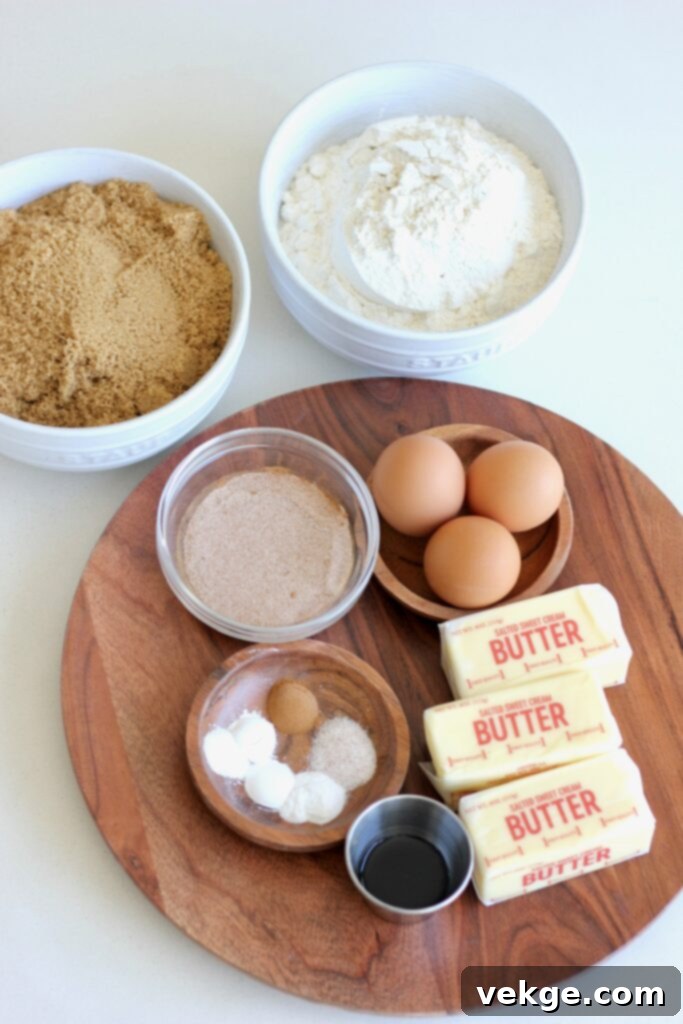 Deliciously soft and chewy snickerdoodle bars baked in a sheet pan, ready to be served at a gathering.